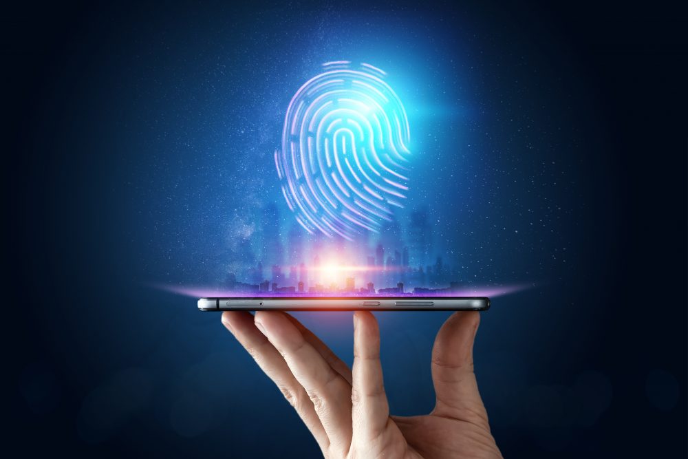digital fingerprint is shown rising above a cell phone