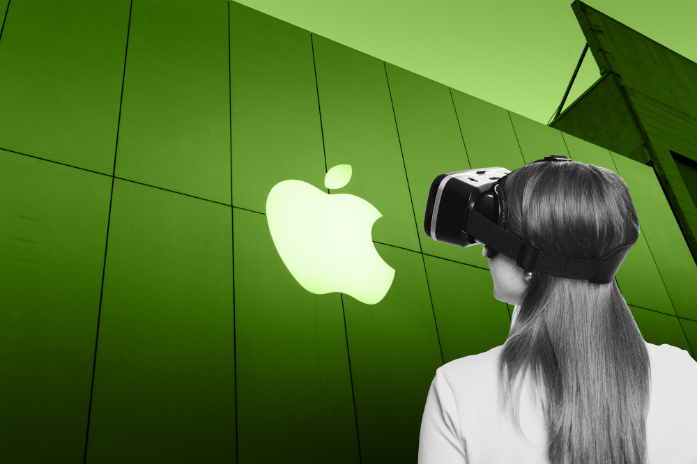 woman wearing a VR headset looking at an Apple Mac store building with big white Apple logo